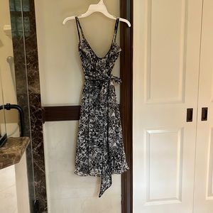Audrey Hepburn black and white dress perfect for a summer party or vacation